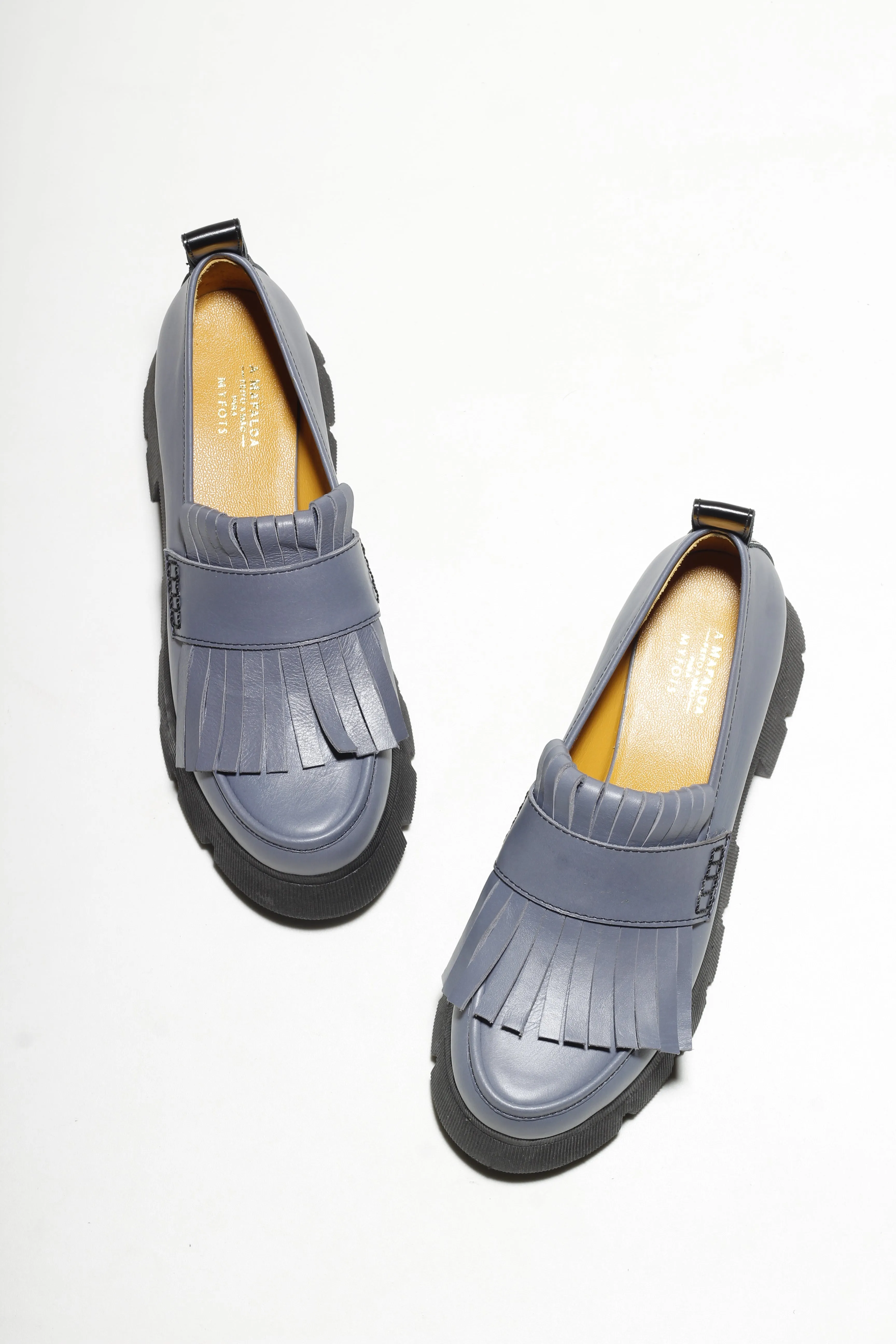 Joanna Indigo Blue Loafer can be optimized and detailed further by adding descriptive modifiers for better clarity and attraction in an e-commerce setting. Here’s an enhanced version:

Joanna Elegant Indigo Blue Leather Loafer for Women